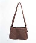 Brown Shield Midi shopper set bagfra. Enkel shopper med brun farve der changere i lyset.