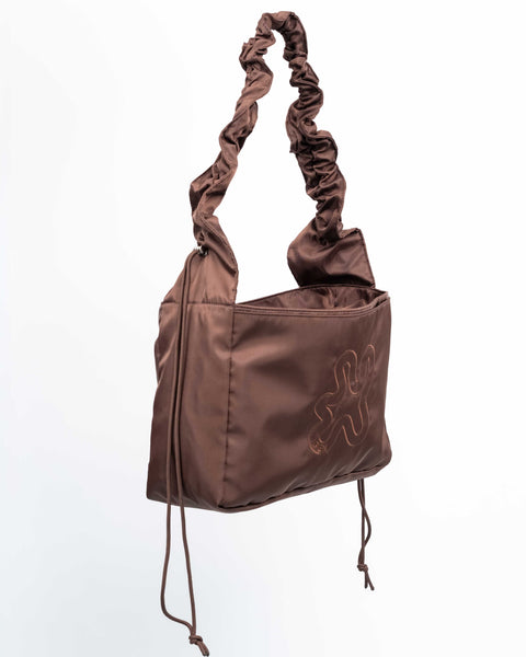 Brown Shield Ruffle Midi med snøre til at justere stroppen. 