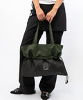 Green Shield Midi shopper med datomærkning. Viser hvornår shopperen er produceret. IGEN swirl logo. 