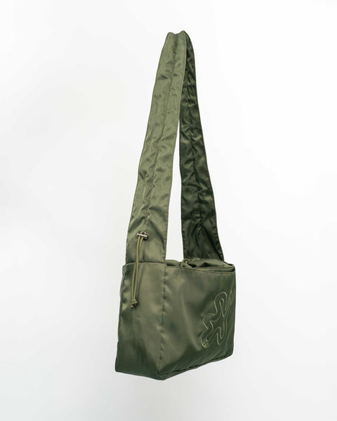 Green Shield Midi med justerbar strop. Juster fra snørerne i siderne, for at gøre stoppen kortere.